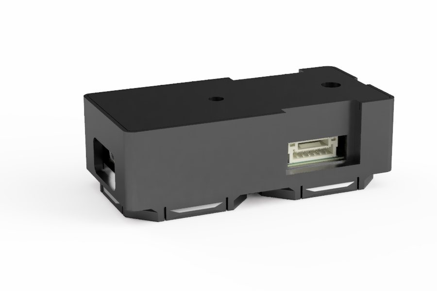 The main module in its printed case, a tile connector on its side and USB-C at one end